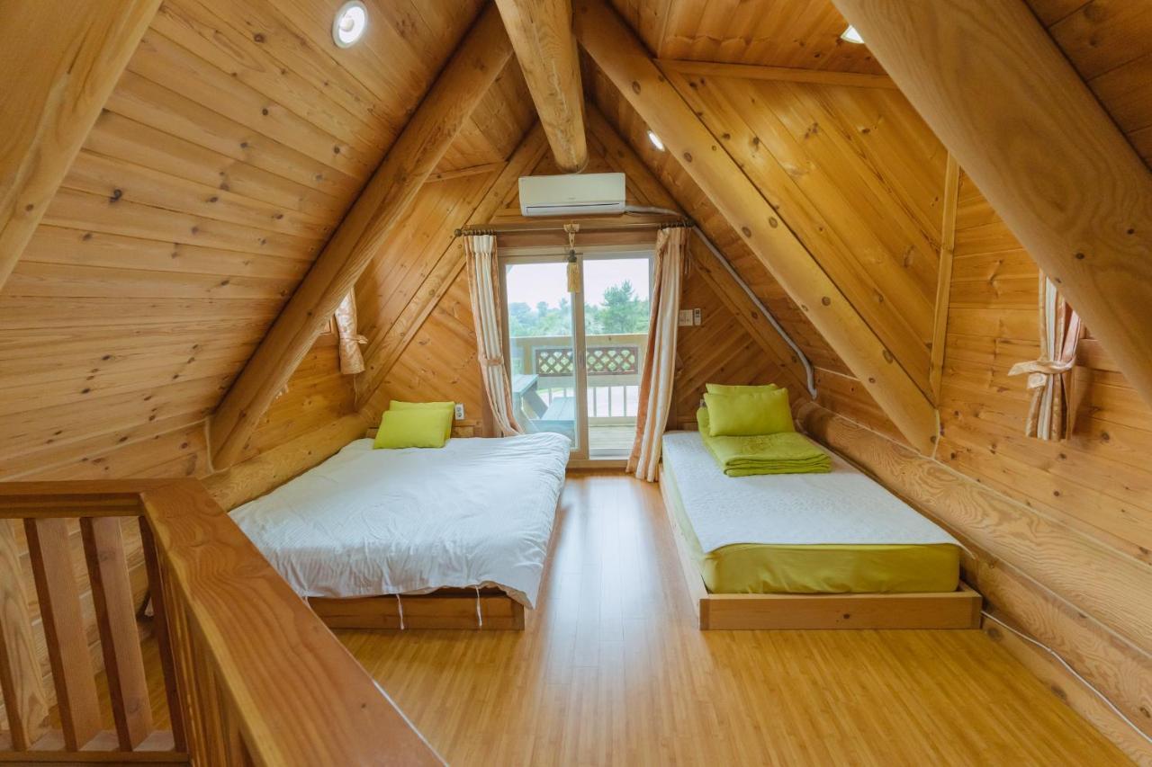 Jungmun Log Pension & Resort ซอกวีโพ ภายนอก รูปภาพ