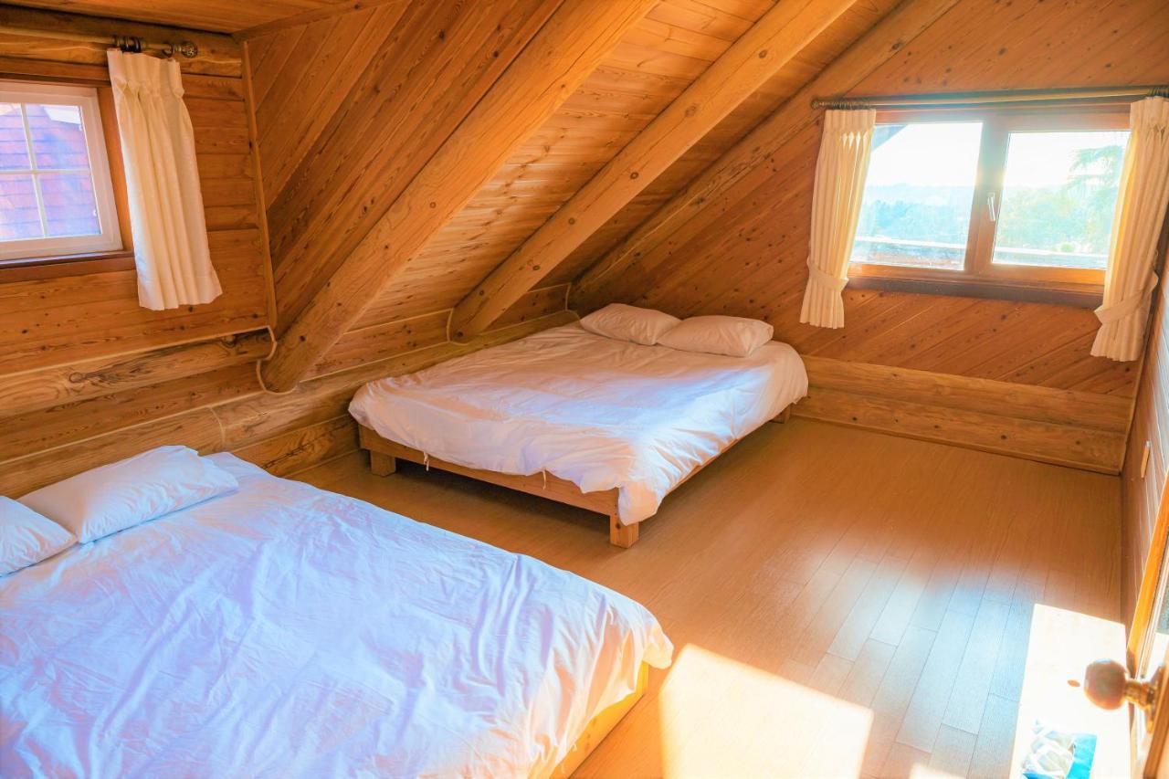Jungmun Log Pension & Resort ซอกวีโพ ภายนอก รูปภาพ