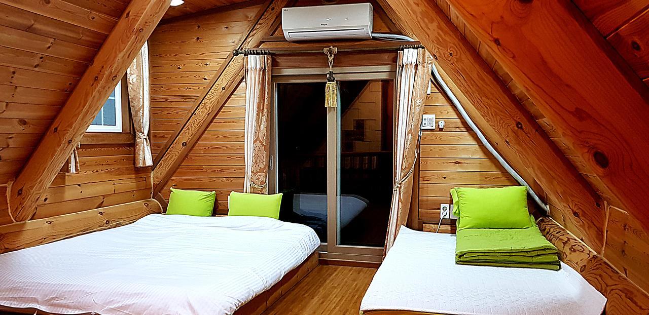 Jungmun Log Pension & Resort ซอกวีโพ ภายนอก รูปภาพ
